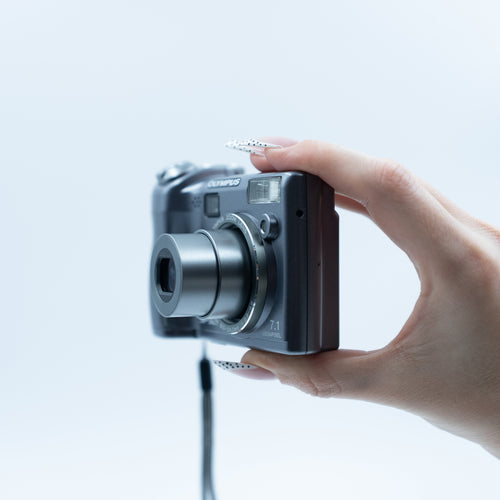Olympus SP-320 ön görünüm | RetroCameraLand
